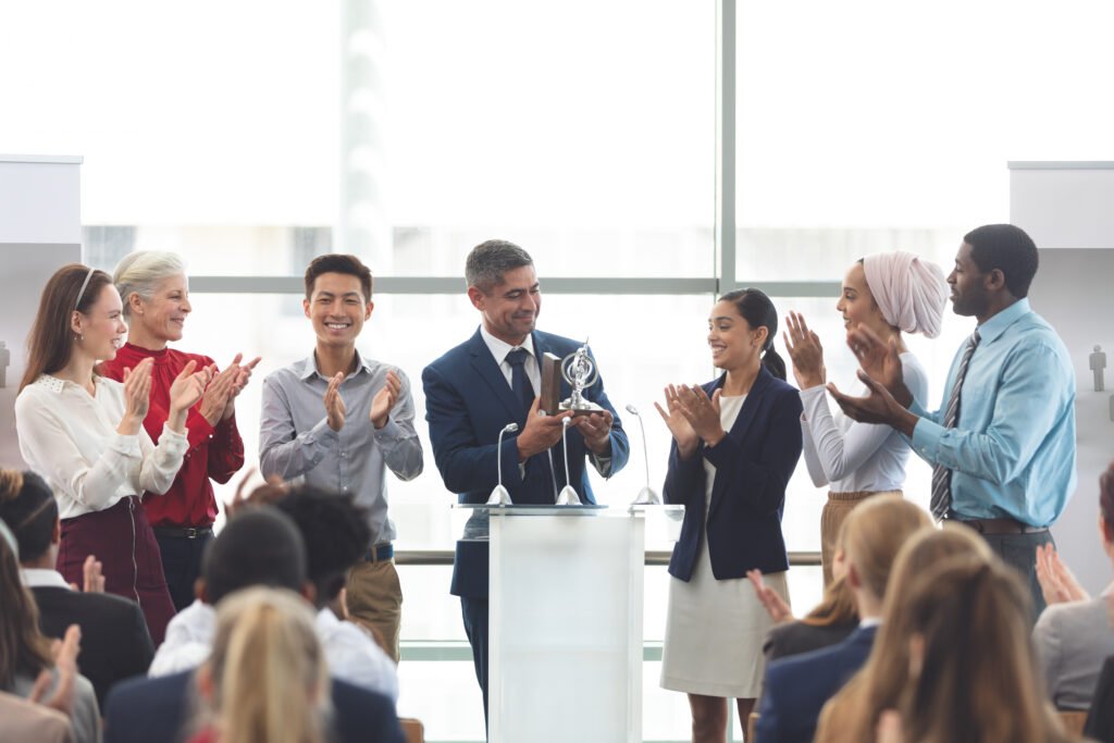 Tech leader winning award at the World AI Tech Expo 2025